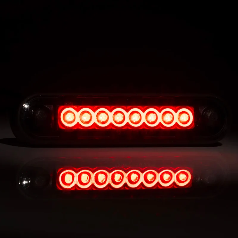 Freni di posizione a LED lunghi Fristom con lente fumé