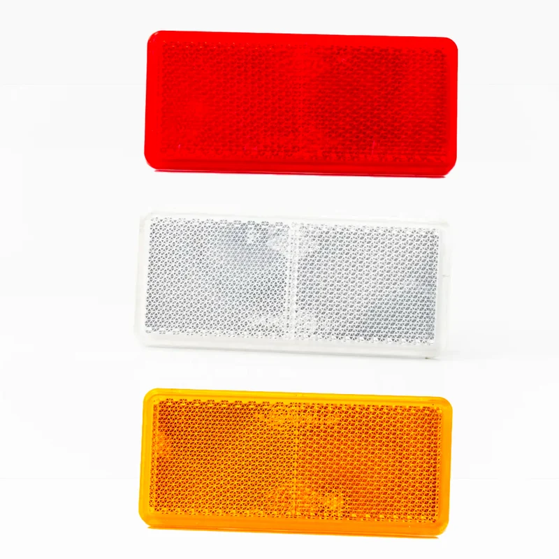 Riflettori rettangolari sottili con retro adesivo / 90 x 40 mm / confezione da 10